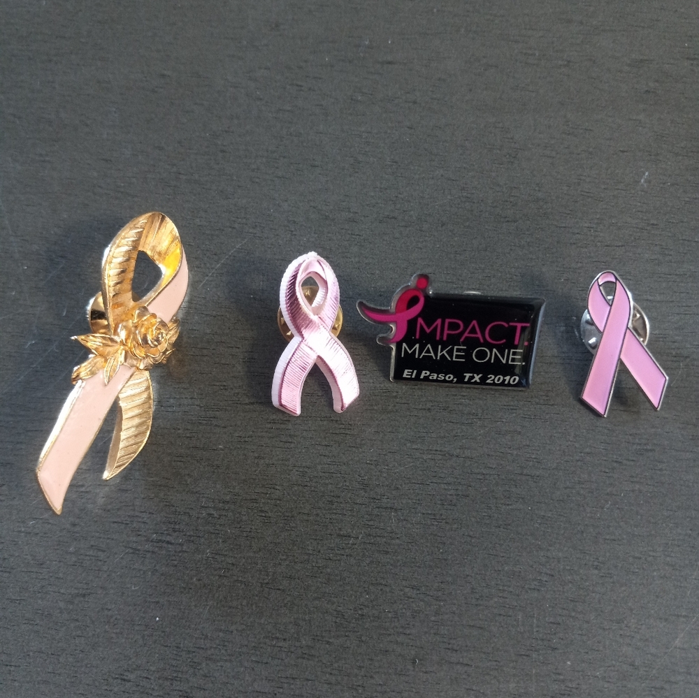 4 Pink Ribbon Cancer Awareness Pin Lot. Preowned but great condition. No broken